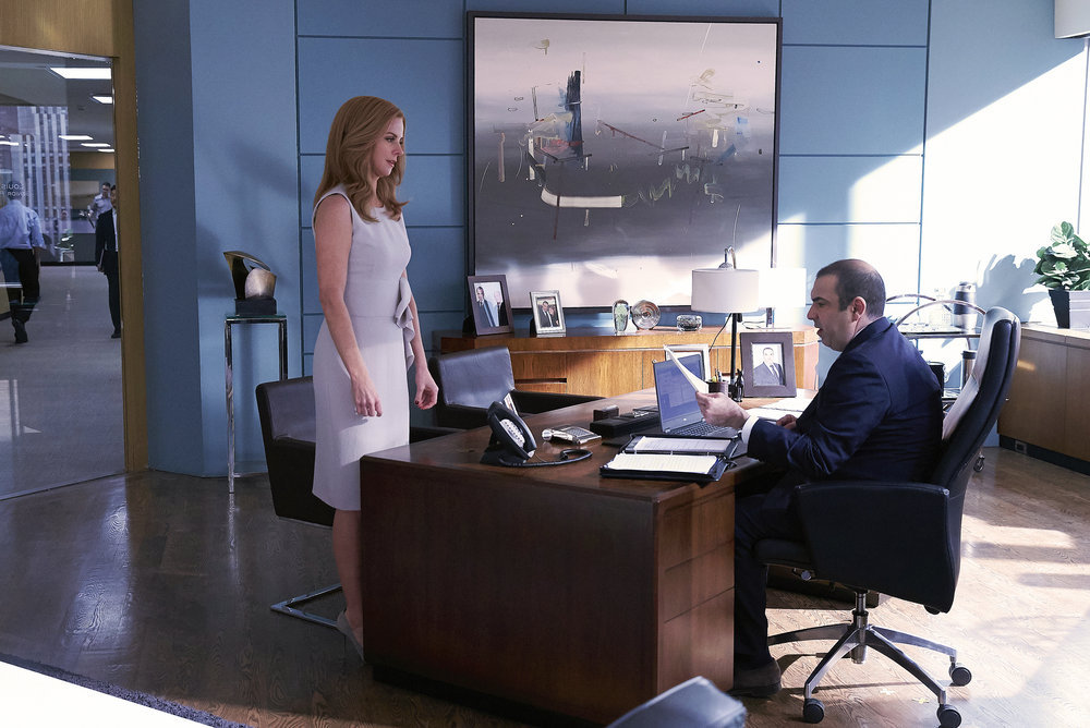 SUITS -- "Shake the Trees" Episode 607 -- Pictured: (l-r) Sarah Rafferty as Donna Paulsen, Rick Hoffman as Louis Litt -- (Photo by: Shane Mahood/USA Network) Suits Photo Preview: Bad News (Season 6 Episode 7) - Part 3