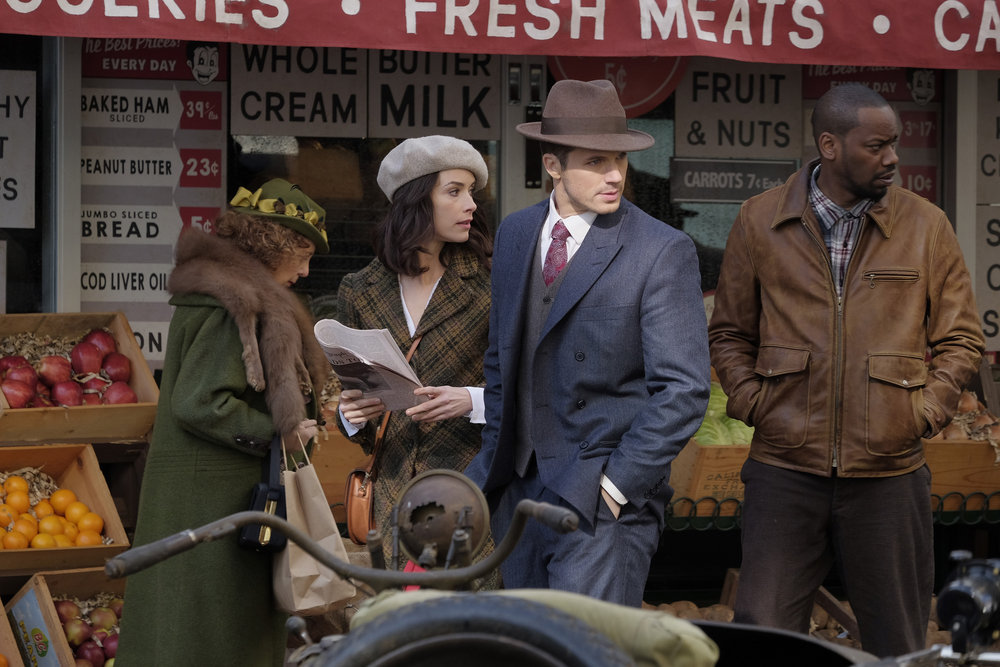TIMELESS -- "Pilot" -- Pictured: (l-r) Abigail Spencer as Lucy Preston, Matt Lanter as Wyatt Logan, Malcolm Barrett as Rufus Carlin -- (Photo by: Joe Lederer/NBC) 22 Most Memorable Costumes From Timeless Season 1