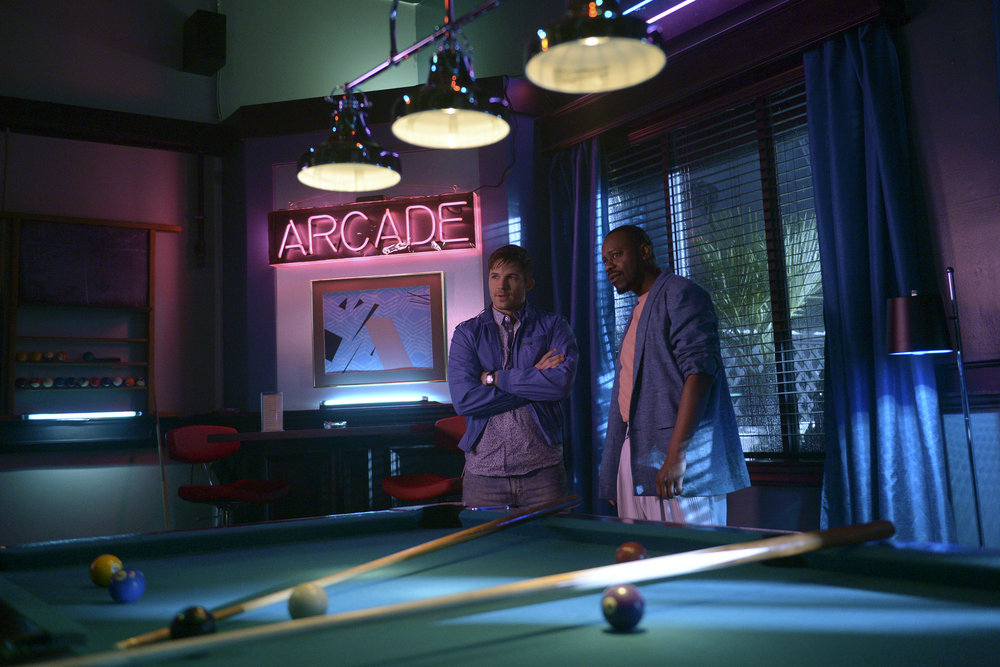 TIMELESS -- "Karma Chameleon" Episode 112 -- Pictured: (l-r) Matt Lanter as Wyatt Logan, Malcolm Barrett as Rufus Carlin -- (Photo by: Sergei Bachlakov/NBC) 22 Most Memorable Costumes From Timeless Season 1 - Part 3